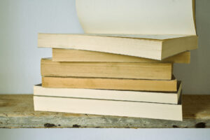 vecteezy_old-books-on-a-shelf_48961245